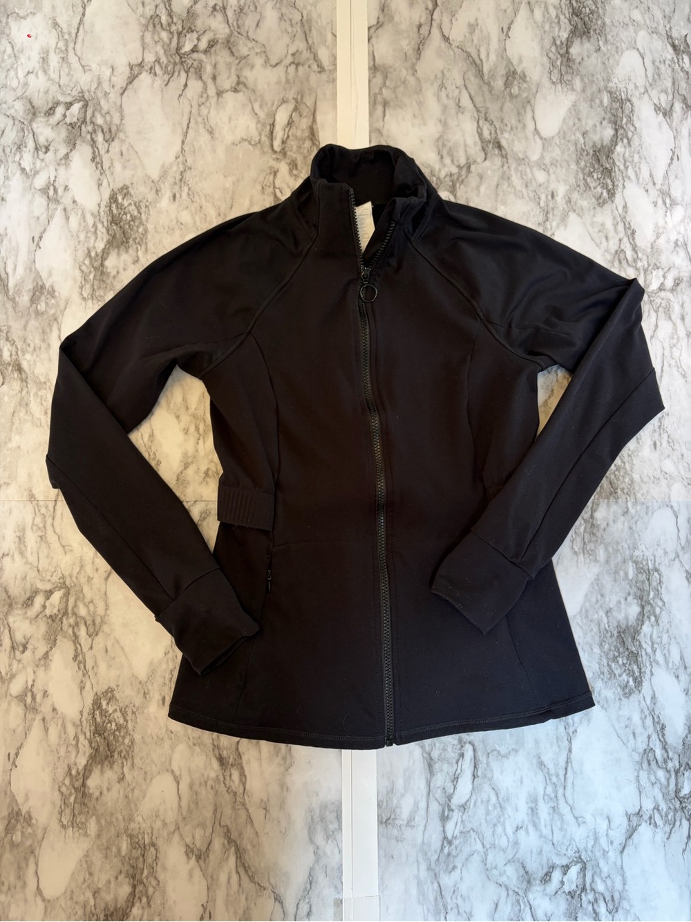 Fabletics Black Zip-Up Jacket‎ in size M slim fit.